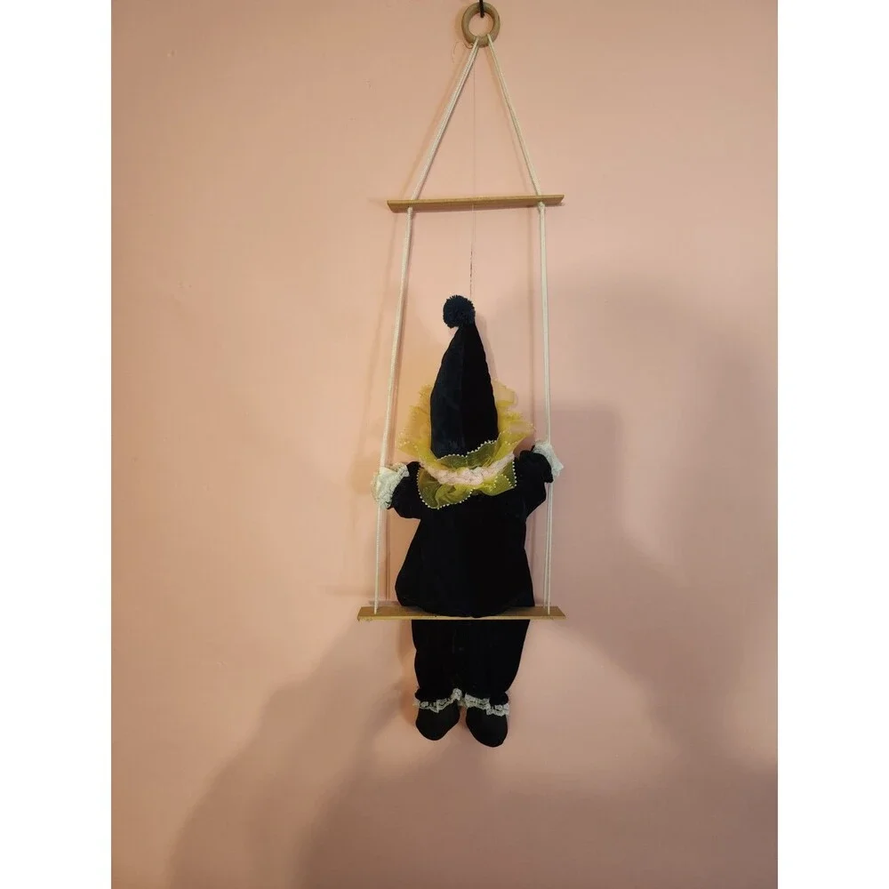 Vintage Clown Doll Sits On Wooden Swing Ceramic Head